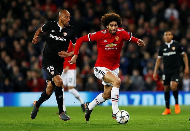 Buna sebep olan durum ise Fellaini'nin fotoğraf çekiminde üstünde sarı kırmızı şeritler bulunan bir tişört giymesi. 

(Akşam)
